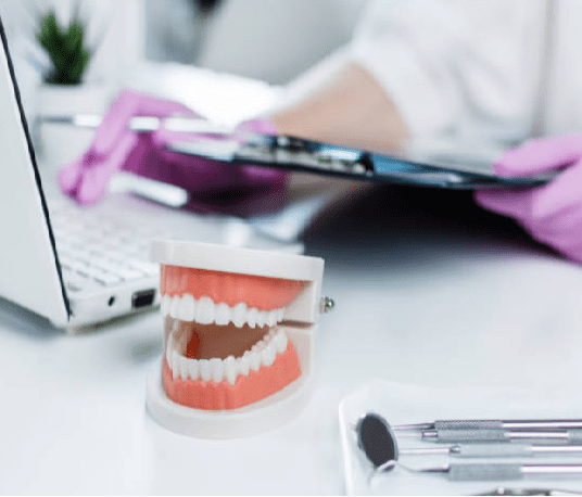 dentist working on the computer